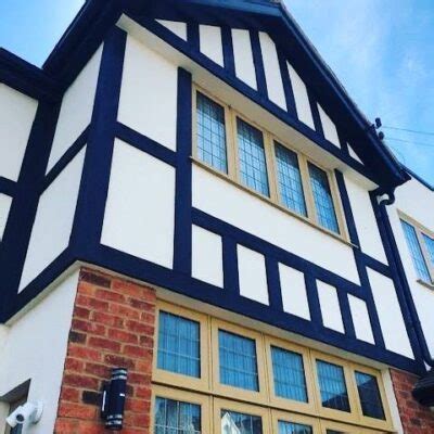 mock tudor replacement cost.